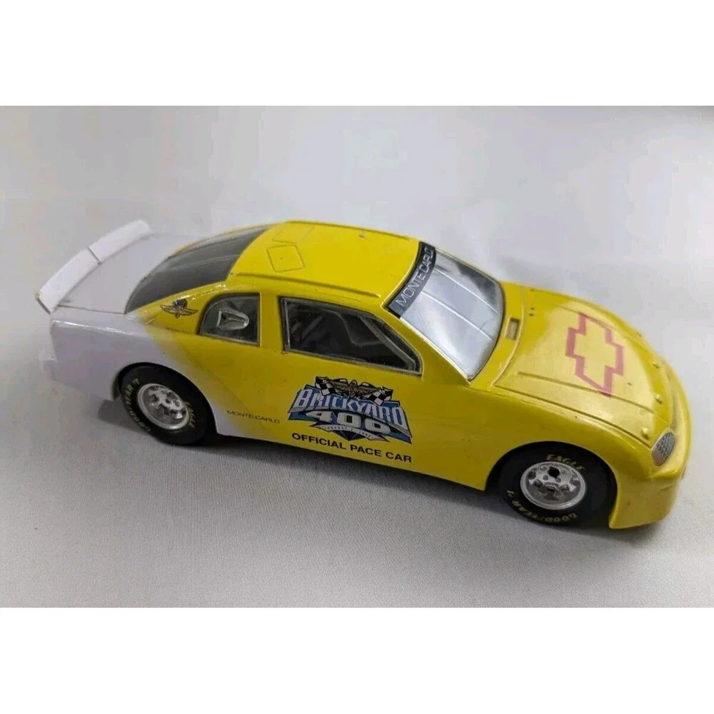 1996 Racing Champions Chevrolet BriCkyard 400 1:64 Monte Carlo Car Yellow